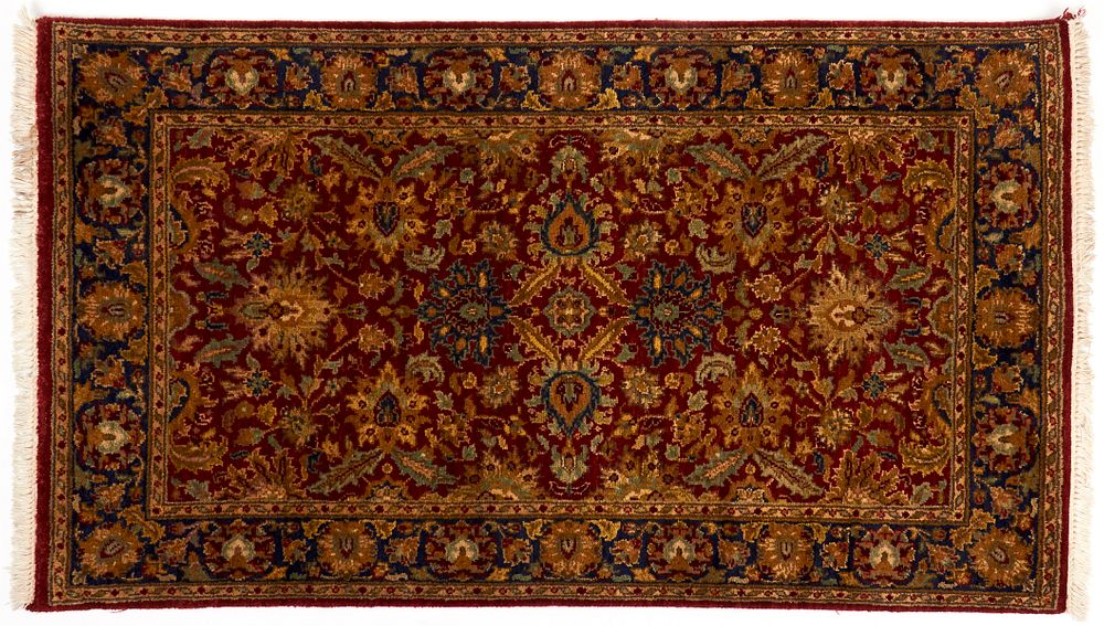 Appraisal: Persian Wool Rug Persian wool rug with a low pile