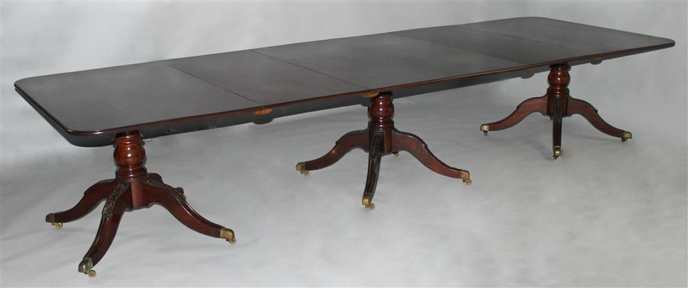 Appraisal: REGENCY MAHOGANY THREE PEDESTAL DINING TABLE the oblong top with