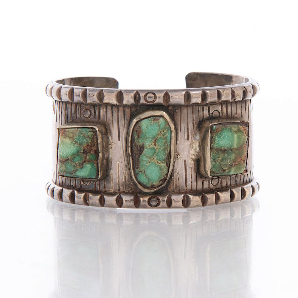 Appraisal: NATIVE AMERICAN SILVER BRACELET WITH GREEN TURQUOISE Cuff bracelet with