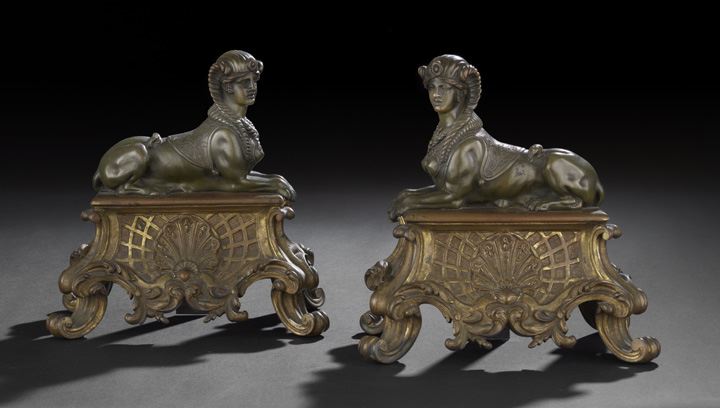 Appraisal: Pair of Gilt- and Patinated Bronze Recumbent Sphinx Chenets first