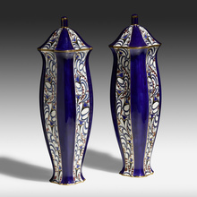 Appraisal: Ernst Wahliss SERAPIS COVERED VASES PAIR Austria c glazed and