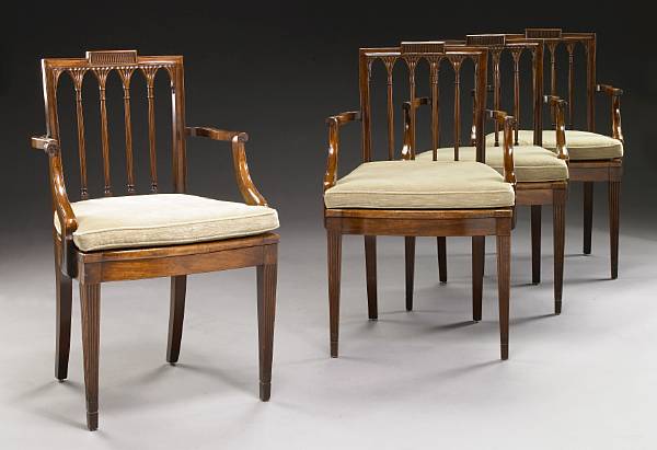 Appraisal: A set of four George III style mahogany armchairs late