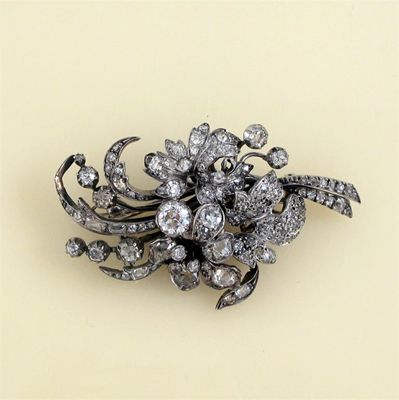 Appraisal: A th century diamond spray brooch set overall with graduated