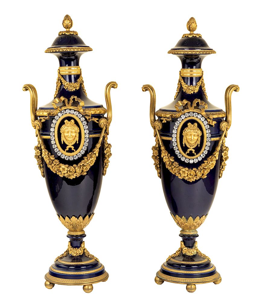 Appraisal: A PAIR OF FRENCH SEVRES-STYLE ORMOLU-MOUNTED VASES LATE TH CENTURY