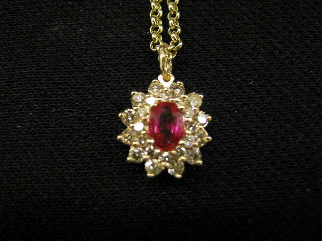 Appraisal: Ruby and Diamond Pendant oval created ruby totaling approx carats