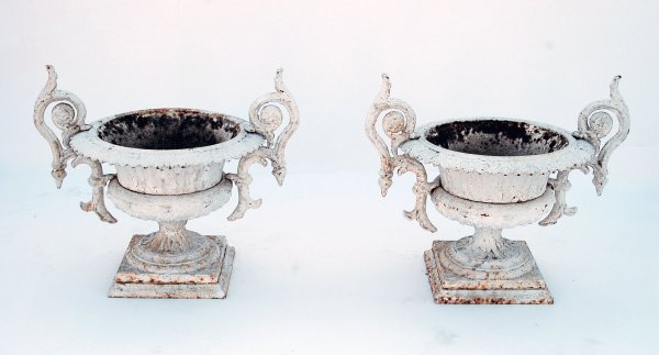 Appraisal: Pair of Victorian cast iron five part garden urns c