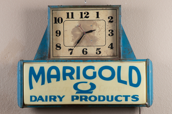 Appraisal: Vintage back lit electric Wall Clock advertising Marigold Dairy Products