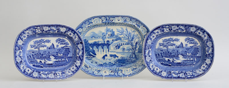 Appraisal: PAIR OF STAFFORDSHIRE BLUE TRANSFER-PRINTED POTTERY PLATTERS AND A LARGER