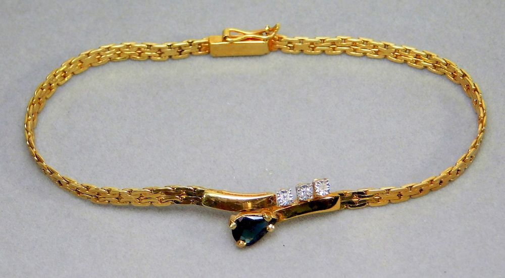 Appraisal: Lady's K Yellow Gold Sapphire Diamond Bracelet United States th