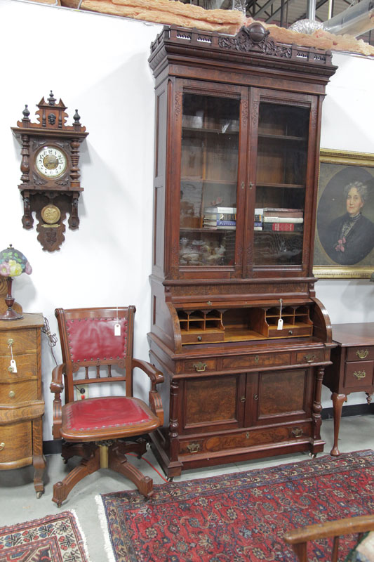 Appraisal: SECRETARY BOOKCASE AND CHAIR Walnut with burlwood accents Carved gallery