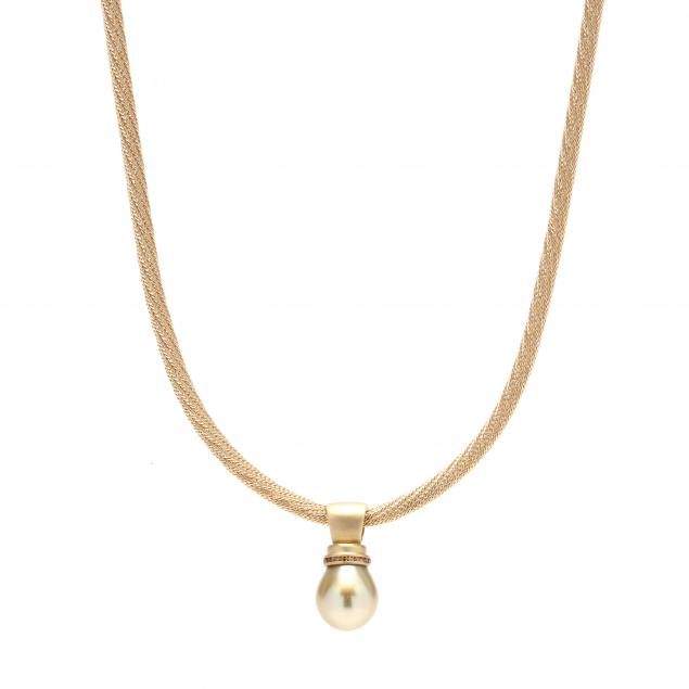 Appraisal: GOLD NECKLACE WITH GOLDEN PEARL The golden pearl mm with