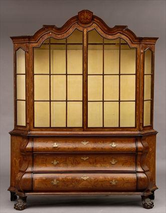 Appraisal: DUTCH ROCOCO-STYLE MARQUETRY-INLAID DISPLAY CABINET The serpentine molded cornice above