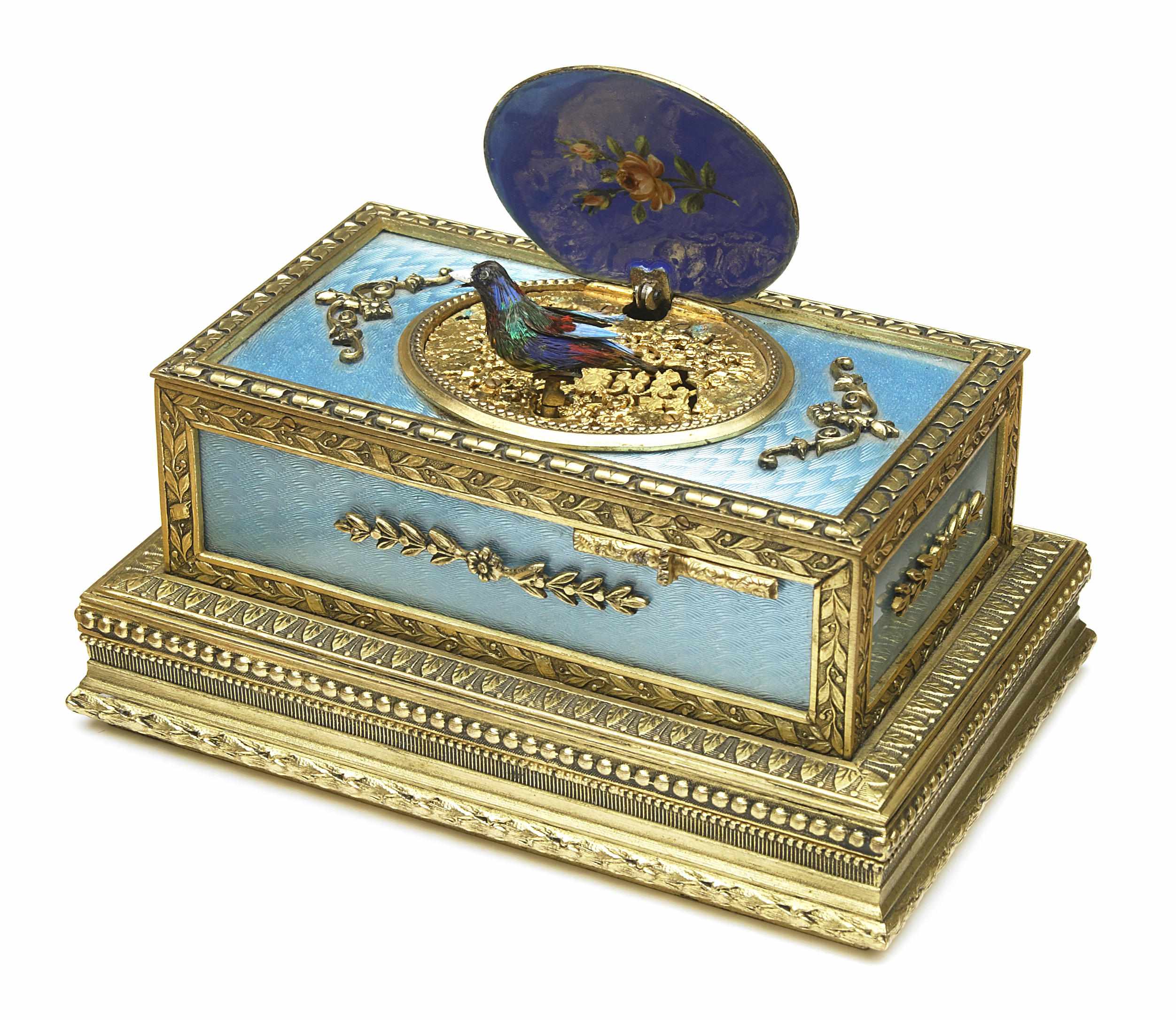 Appraisal: A Swiss gilt bronze and enamel singing bird music box