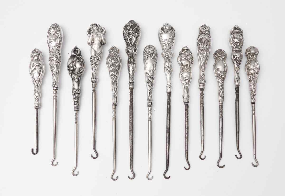 Appraisal: COLLECTION ART NOUVEAU STERLING BUTTON BOOT HOOKS pieces to include