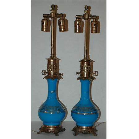 Appraisal: Pair of Gilt Decorated Blue Opaline Glass Lamps Estimate -