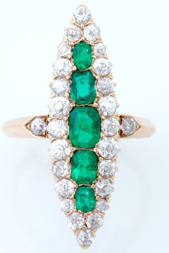 Appraisal: Diamond and emerald navette ring in k yg Tapered row