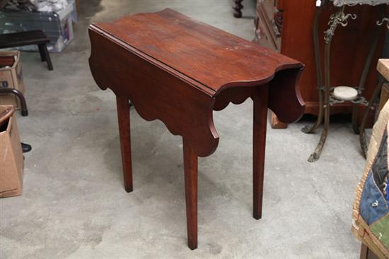 Appraisal: DROP LEAF TABLE Walnut with shaped top apron and leaves