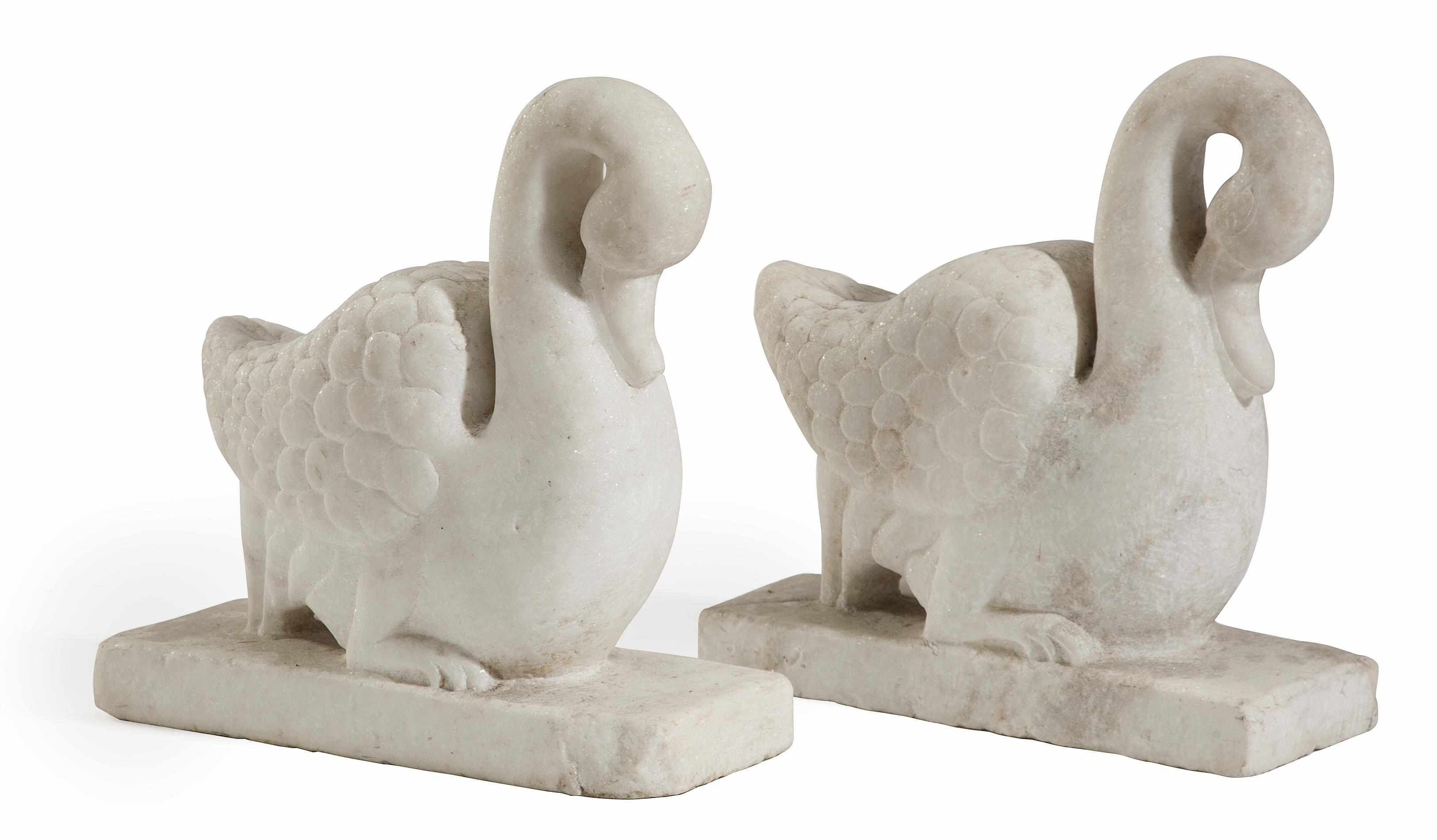 Appraisal: A pair of Continental carved marble models of swans early