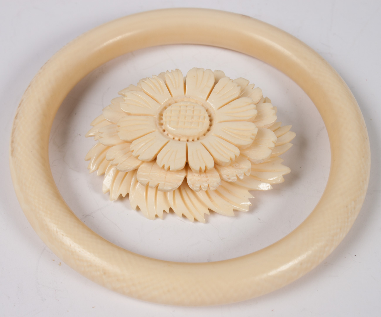 Appraisal: Ivory bangle bracelet carved bone flower brooch brooch - about