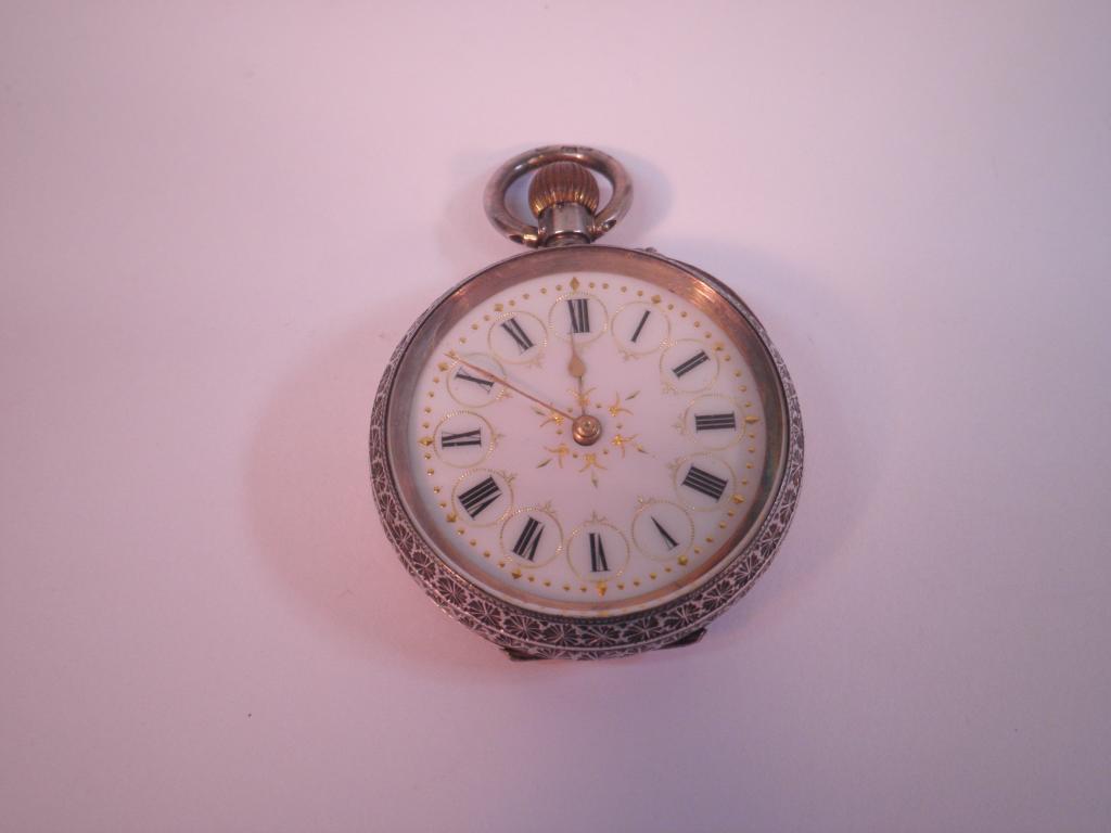 Appraisal: A continental silver fob watch enamelled dial with gilt decoration