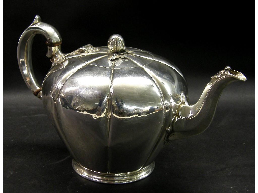 Appraisal: Attractive Victorian teapot of lobed tapered form mounted by moulded