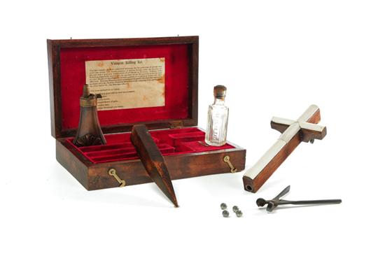 Appraisal: VAMPIRE KILLING KIT American th century Fitted wooden case with