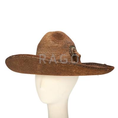 Appraisal: MEXICAN SOMBRERO Straw and leather with metal mounts late th