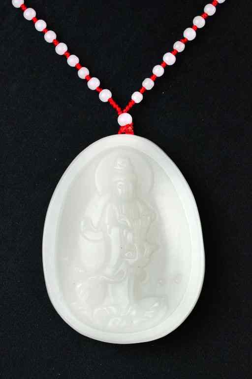 Appraisal: Chinese White Jade Beaded Necklace PendantThe pendant finely carved to