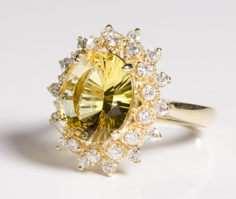 Appraisal: GOLDEN BERYL DIAMOND AND FOURTEEN KARAT GOLD RING centering a