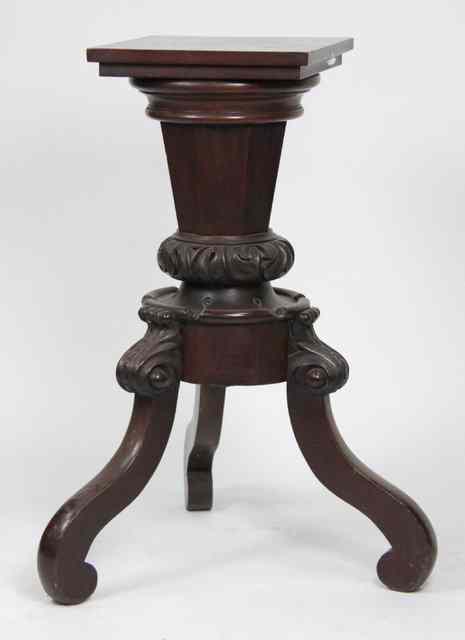 Appraisal: A Victorian mahogany jardini re stand on a carved tapered