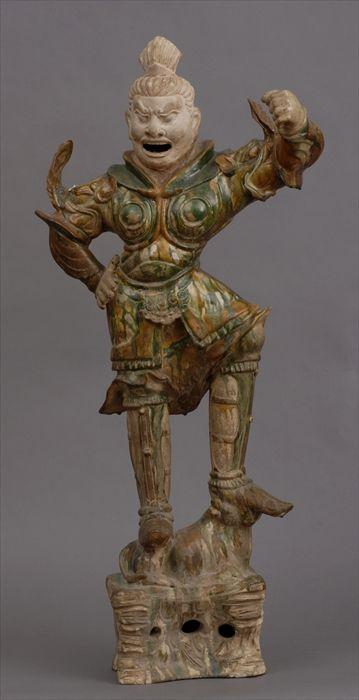 Appraisal: SANCAI-GLAZED POTTERY LOKAPALA The soldier with open mouth right hand