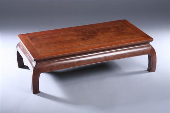 Appraisal: CHINESE WOOD LOW TABLE The rectangular top above beaded apron