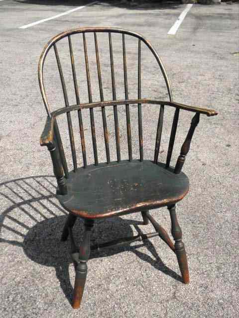 Appraisal: Early th century Windsor bow back wooden arm chair with