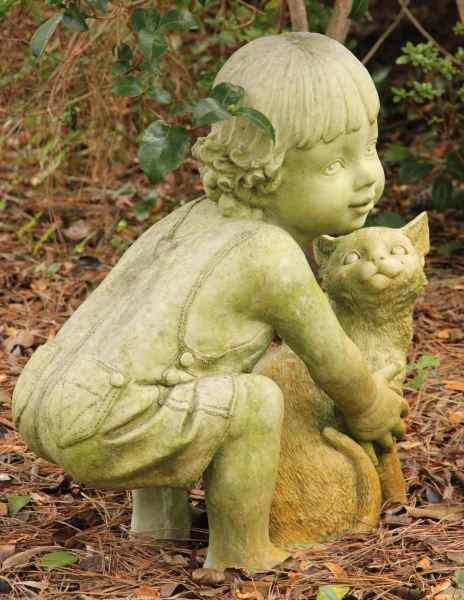 Appraisal: Charming Garden Sculptureresin featuring a child and cat in