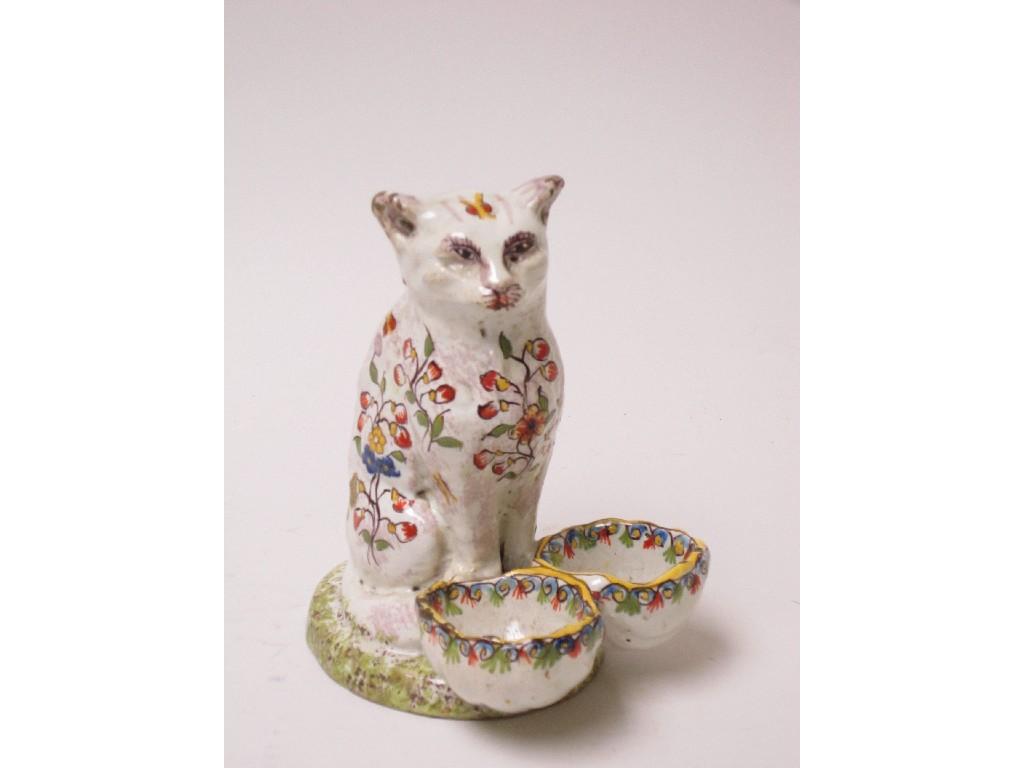 Appraisal: A th Century faience pottery Cat seated with two bowls