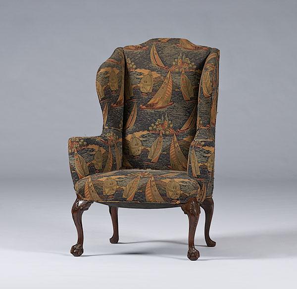 Appraisal: GEORGIAN-STYLE WING CHAIR English th century in mahogany with cabriole