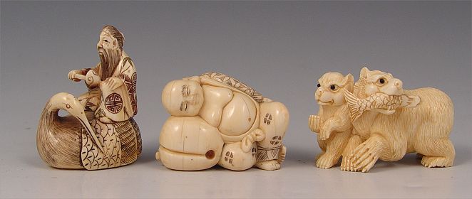 Appraisal: JAPANESE CARVED IVORY NETSUKE OKIMONO To include Man on swan