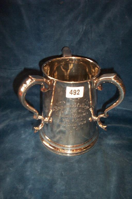 Appraisal: A th century silver-plated -handled trophy inscribed Emmanuel College Lawn