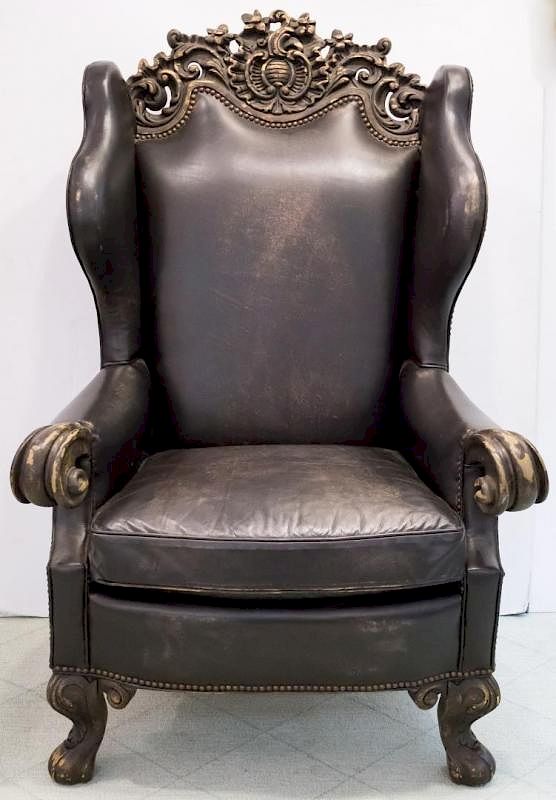 Appraisal: Continental Leather Wood Wing Chair Continental black leather and carved