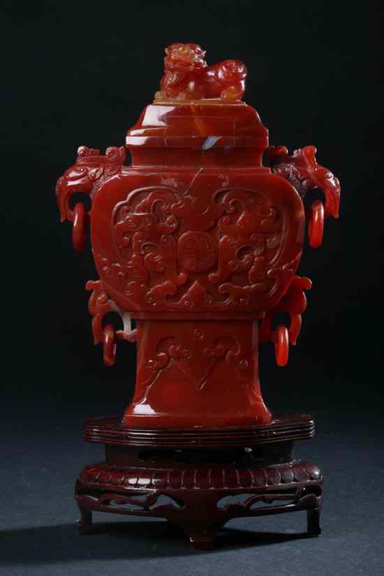 Appraisal: CHINESE AGATE VASE AND COVER Carved to depict shou character