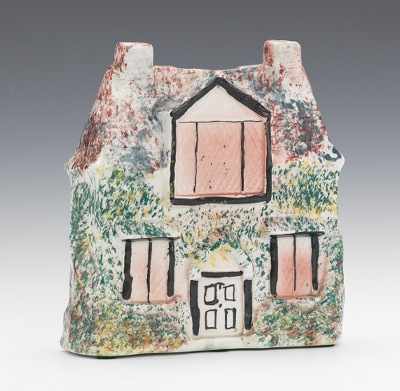 Appraisal: A Glazed Pottery Cottage Money Box Molded pottery cottage with