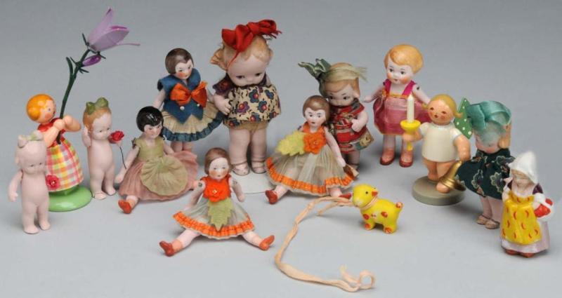 Appraisal: Lot of All-Bisque Wooden Dolls Description Germany Ca Five all-original