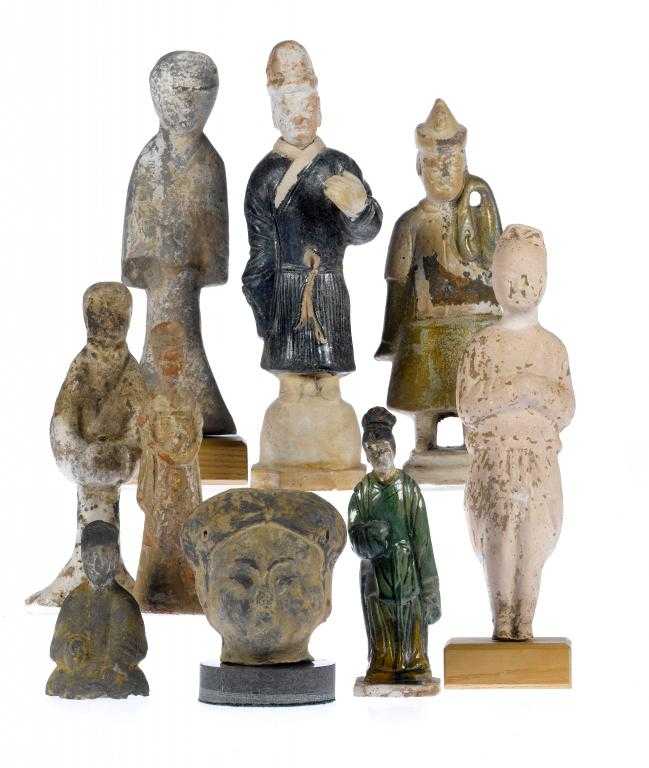 Appraisal: EIGHT EARLY CHINESE EARTHENWARE SCULPTURES of court ladies an officer