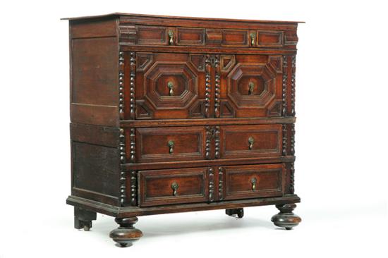 Appraisal: JACOBEAN-STYLE CHEST OF DRAWERS England th century oak Two-piece section