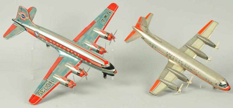 Appraisal: Lot of Tin Litho Airplane Toys Description Working Includes one