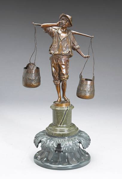 Appraisal: A German bronze figure of a water carrier after Franz