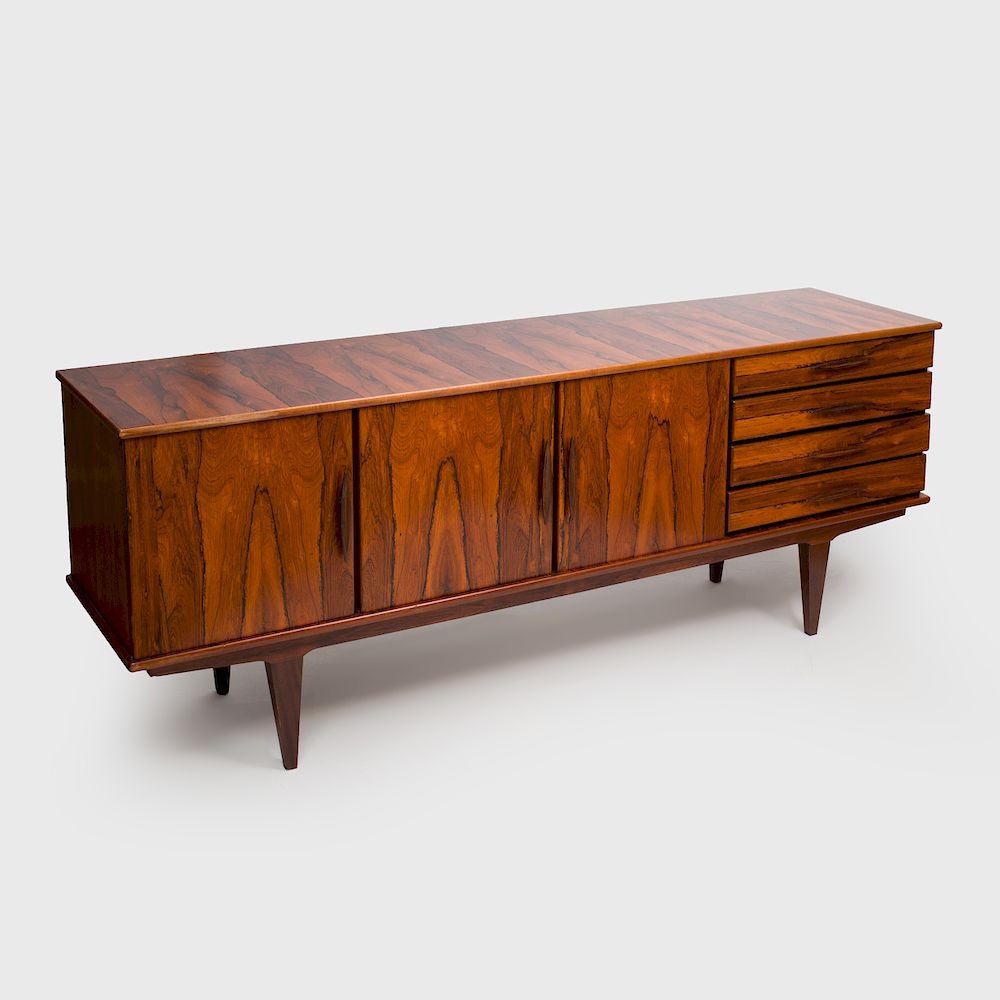 Appraisal: Italian Rosewood Credenza Two cabinets fitted with a shelf next