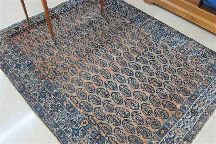 Appraisal: SEMI-ANTIQUE PERSIAN TRIBAL AREA RUG overall repeating boteh design on