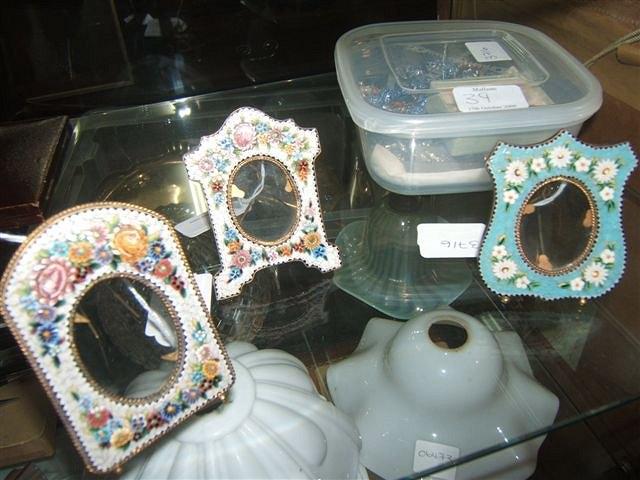 Appraisal: Three micro mosaic miniature picture frames each with floral designs