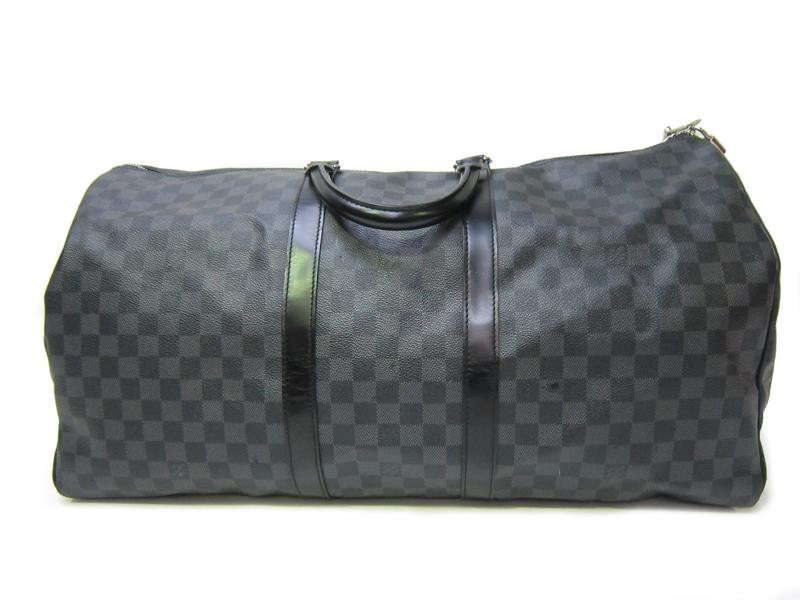 Appraisal: A LOUIS VUITTON KEEPALL TRAVEL BAG IN DAMIER GRAPHITE CANVAS